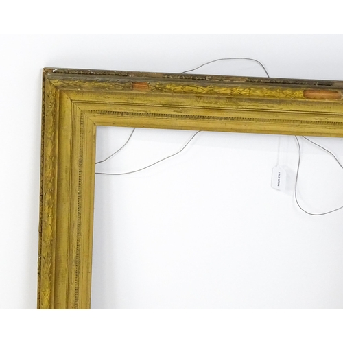 2254 - A 19thC gilt composite frame with banded foliate detail. Rebate approx. 24 3/4