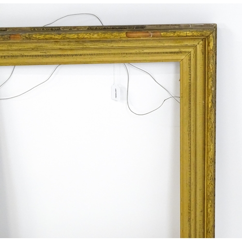 2254 - A 19thC gilt composite frame with banded foliate detail. Rebate approx. 24 3/4