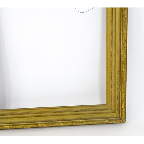 2254 - A 19thC gilt composite frame with banded foliate detail. Rebate approx. 24 3/4