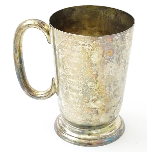 631 - A silver mug / tankard with loop handle hallmarked Sheffield 1920, maker Cooper Brothers & Sons Ltd.... 