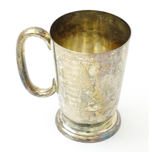 631 - A silver mug / tankard with loop handle hallmarked Sheffield 1920, maker Cooper Brothers & Sons Ltd.... 