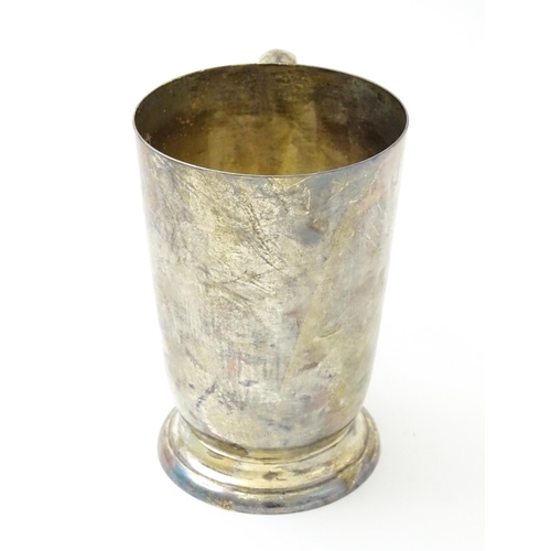 631 - A silver mug / tankard with loop handle hallmarked Sheffield 1920, maker Cooper Brothers & Sons Ltd.... 