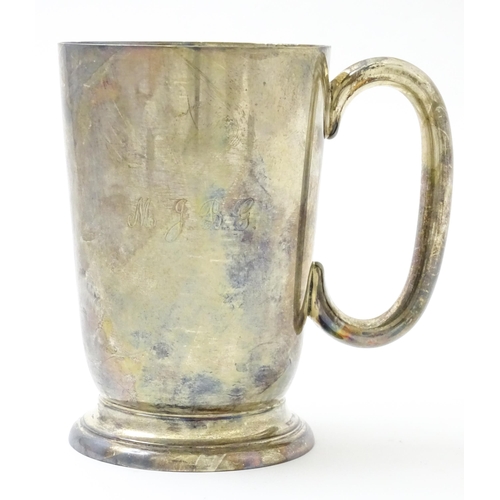 631 - A silver mug / tankard with loop handle hallmarked Sheffield 1920, maker Cooper Brothers & Sons Ltd.... 