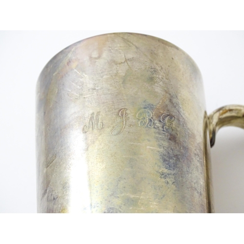 631 - A silver mug / tankard with loop handle hallmarked Sheffield 1920, maker Cooper Brothers & Sons Ltd.... 