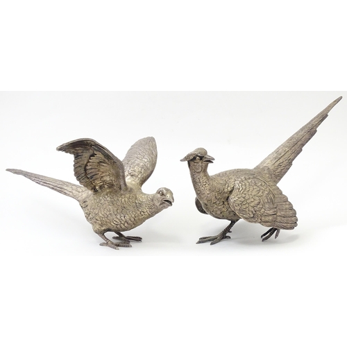 635 - A pair of silver models of pheasants hallmarked London 1989 / 1990, maker Edward Barnard & Sons Ltd.... 