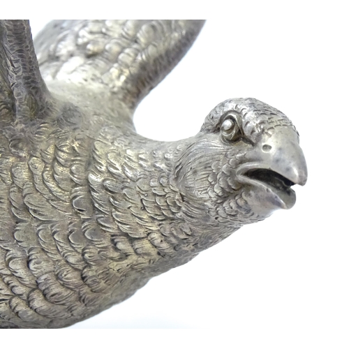 635 - A pair of silver models of pheasants hallmarked London 1989 / 1990, maker Edward Barnard & Sons Ltd.... 