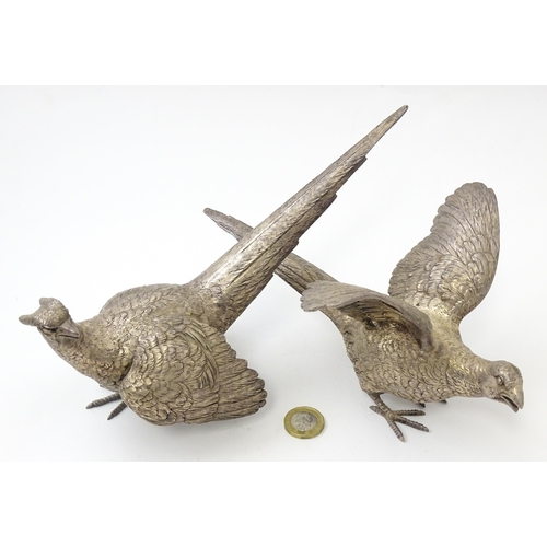 635 - A pair of silver models of pheasants hallmarked London 1989 / 1990, maker Edward Barnard & Sons Ltd.... 