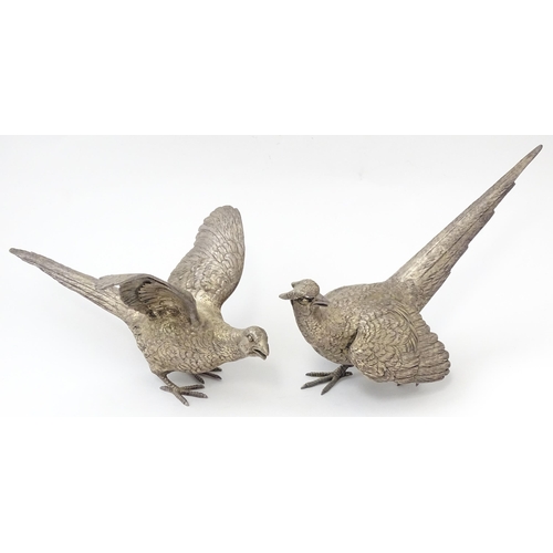 635 - A pair of silver models of pheasants hallmarked London 1989 / 1990, maker Edward Barnard & Sons Ltd.... 