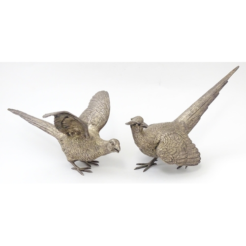 635 - A pair of silver models of pheasants hallmarked London 1989 / 1990, maker Edward Barnard & Sons Ltd.... 