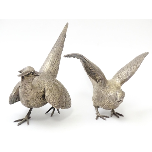 635 - A pair of silver models of pheasants hallmarked London 1989 / 1990, maker Edward Barnard & Sons Ltd.... 