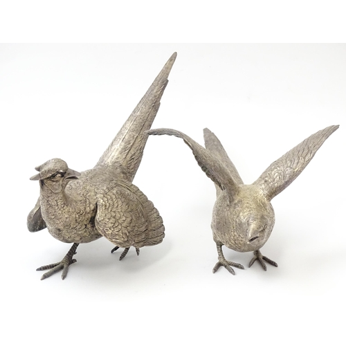 635 - A pair of silver models of pheasants hallmarked London 1989 / 1990, maker Edward Barnard & Sons Ltd.... 