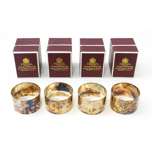 637 - A set of four silver napkin rings hallmarked Sheffield 1976, maker Mappin & Webb Ltd. (TW approx. 12... 