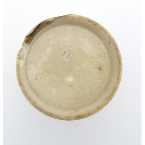 128 - A 19thC Price & Co. Circassian Cream pot lid and base decorated with an elegant lady to centre with ... 