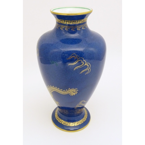 129A - A Wedgwood vase with Celestial Dragon decoration. Marked under and numbered Z4616. Approx. 8 1/2