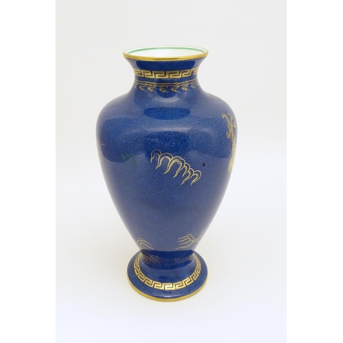 129A - A Wedgwood vase with Celestial Dragon decoration. Marked under and numbered Z4616. Approx. 8 1/2