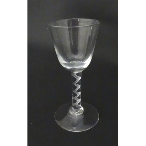 538 - A drinking glass with air twist detail to stem. Approx. 5 1/2