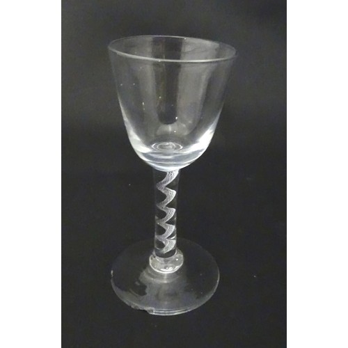 538 - A drinking glass with air twist detail to stem. Approx. 5 1/2