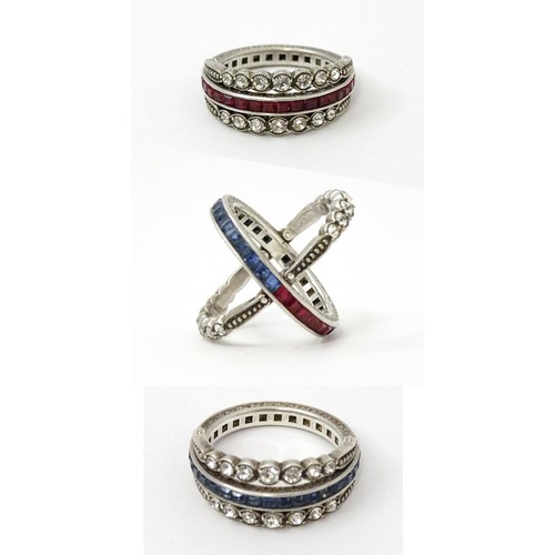 773 - An unusual metamorphic Art Deco eternity ring the central band half set with red stones and half set... 