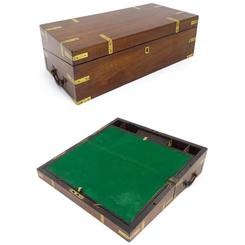 1550 - A 19thC brass bound mahogany writing slope with drawer to one side and having a fitted interior. App... 