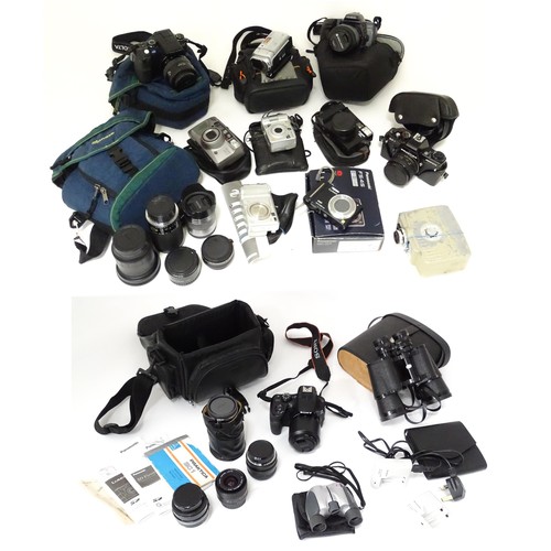 249 - A quantity of assorted cameras and accessories to include a Sony Alpha 3000 DSLR, a Sony DCR-SX44, a... 