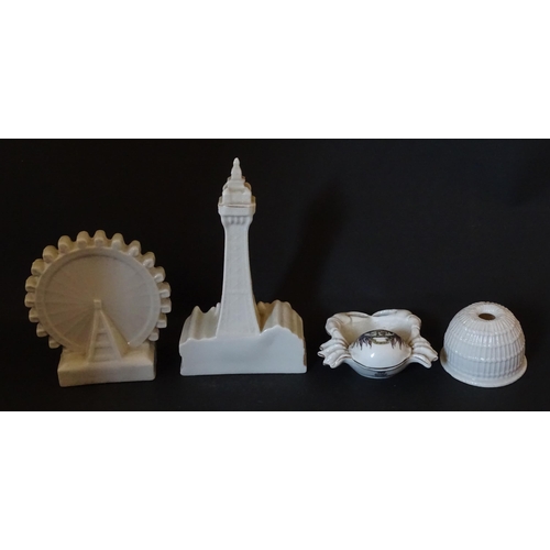 141 - Four items of Crested china comprising a W. H. Goss Model of a Lobster Trap for Lowestoft, an Arcadi... 