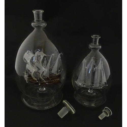 209 - Two 20thC glass ships in bottles on turned wooden stands, one titled Winston Churchill, the other Ma... 