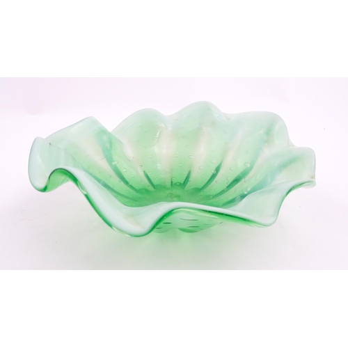 218 - A green and white art glass bowl with flared rim and controlled bubble detail. Approx. 9