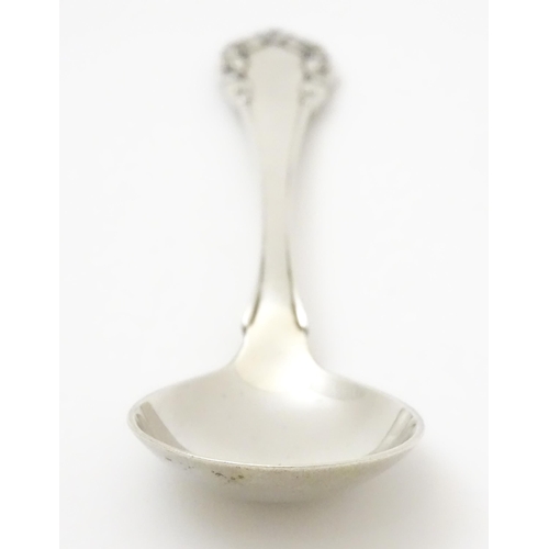 312 - Scandinavian silver : A Danish silver jam Spoon by Georg Jensen decorated in the Lily of the Valley ... 