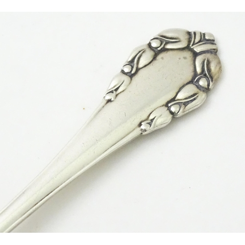 312 - Scandinavian silver : A Danish silver jam Spoon by Georg Jensen decorated in the Lily of the Valley ... 