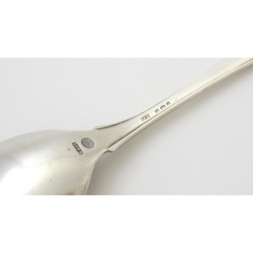 312 - Scandinavian silver : A Danish silver jam Spoon by Georg Jensen decorated in the Lily of the Valley ... 