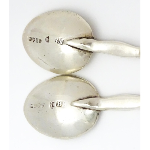 424 - A quantity of assorted silver items to include sugar tongs hallmarked Sheffield 1956, maker Viner's ... 