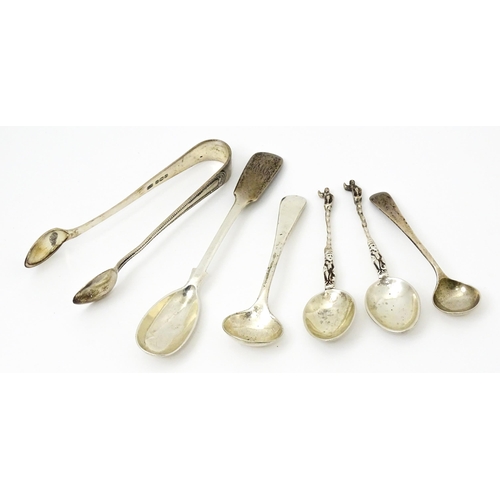 424 - A quantity of assorted silver items to include sugar tongs hallmarked Sheffield 1956, maker Viner's ... 