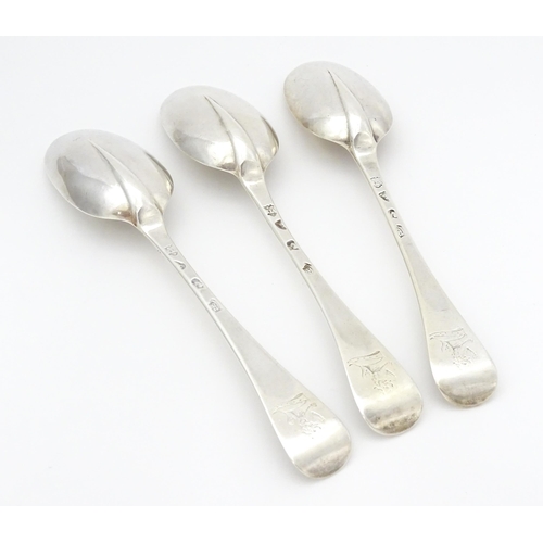 428 - Three Queen Anne Britannia silver Hanoverian pattern dessert spoons with rat tail bowls, hallmarked ... 