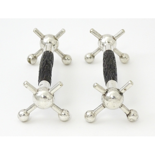 440 - A pair of silver knife rests with antler detail, hallmarked Sheffield 1913, maker John Biggin. Appro... 