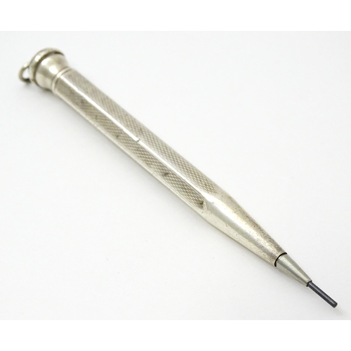 456 - A Sterling silver propelling pencil. Approx. 3 1/2