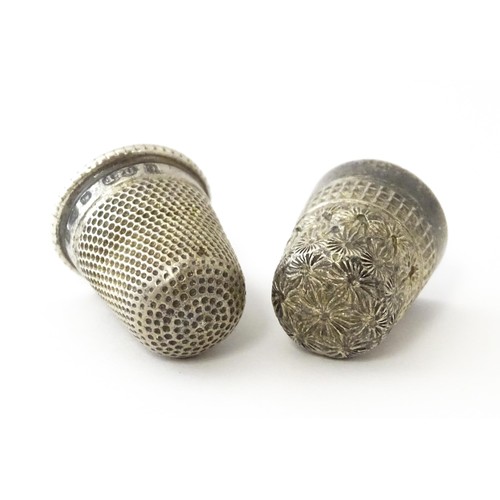 461 - A Victorian silver thimble hallmarked Chester 1897, maker Deakin & Francis. Together with a DORCAS C... 