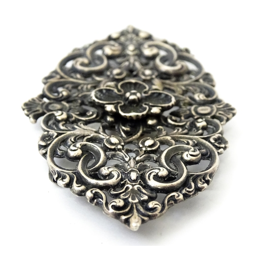 462 - A Victorian silver buckle with acanthus scroll and floral detail, hallmarked Birmingham 1897, maker ... 