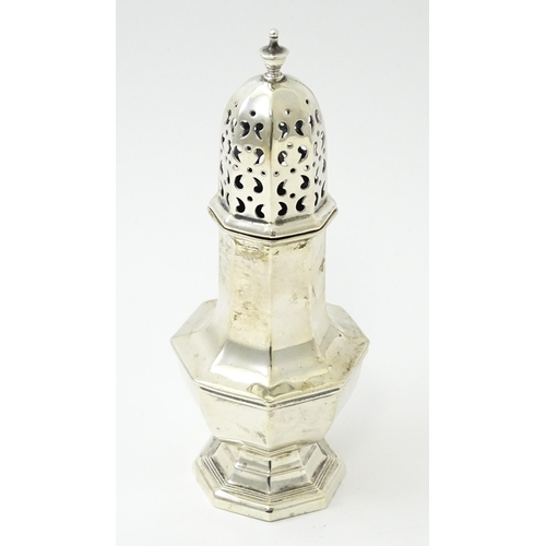 469 - A silver sugar caster hallmarked Sheffield 1929, maker Walker & Hall. Approx. 6 1/2