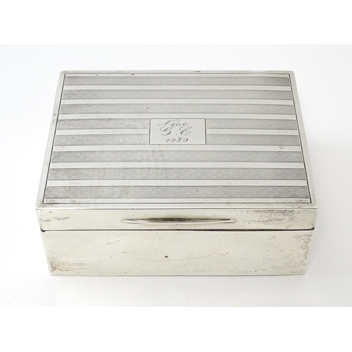 471 - An Art Deco silver cigarette box with engine turned decoration hallmarked London 1926, maker Mappin ... 