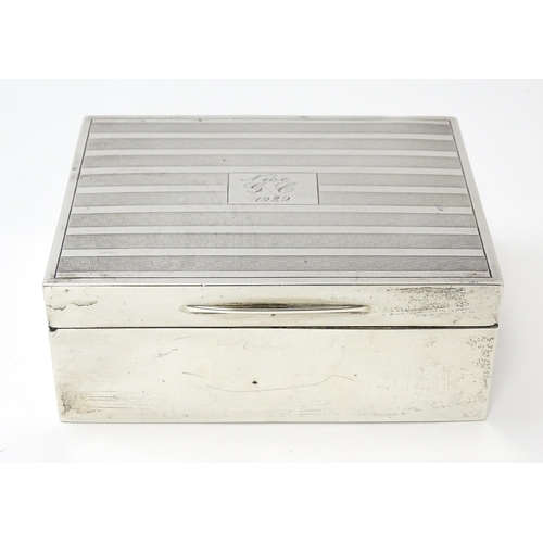 471 - An Art Deco silver cigarette box with engine turned decoration hallmarked London 1926, maker Mappin ... 