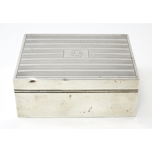 471 - An Art Deco silver cigarette box with engine turned decoration hallmarked London 1926, maker Mappin ... 