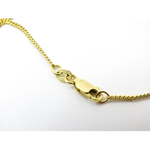 744 - A 9ct gold necklace with 9ct gold pendant set with white stones. The whole approx. 19