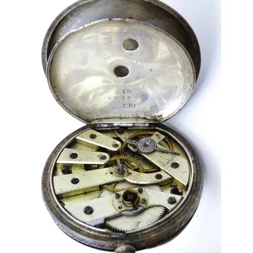 802 - A Victorian silver cased key wind pocket watch, the enamel dial with floral detail, the case hallmar... 