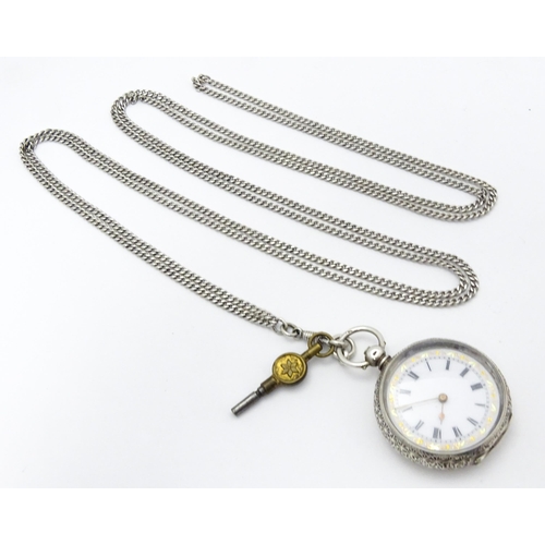 803 - A Swiss .935 silver cased key wind fob watch, the white enamel dial with foliate border, and Roman c... 