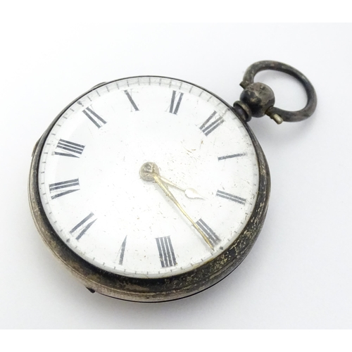 804 - A Swiss .935 silver cased key wind fob watch, the white enamel dial with foliate border, and Roman c... 