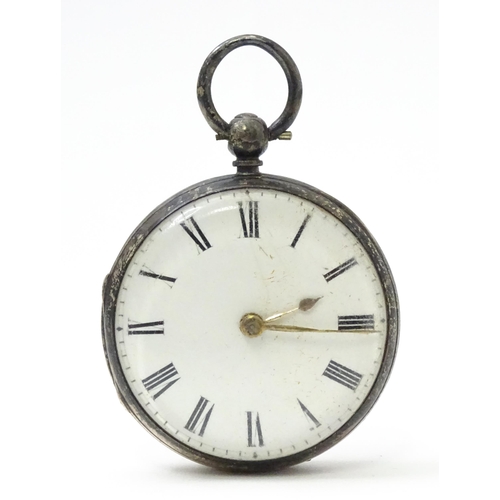 804 - A Swiss .935 silver cased key wind fob watch, the white enamel dial with foliate border, and Roman c... 