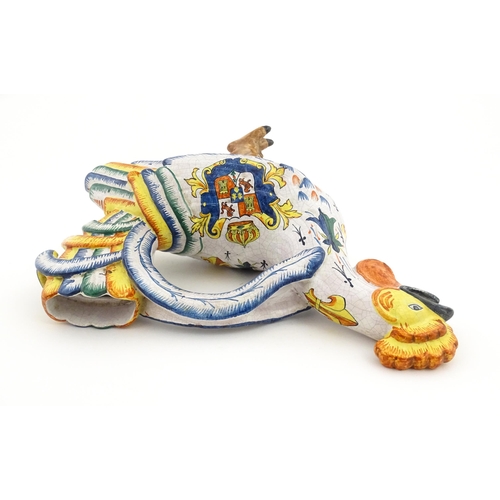 69 - A Continental faience style novelty teapot modelled as a cockerel / rooster decorated with Spanish h... 