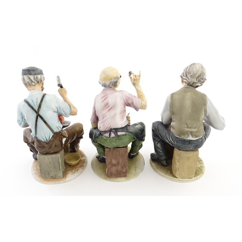 73 - Three Capodimonte figures comprising The Stein Maker, The Clock Repairer, and The Ironmonger. Two si... 