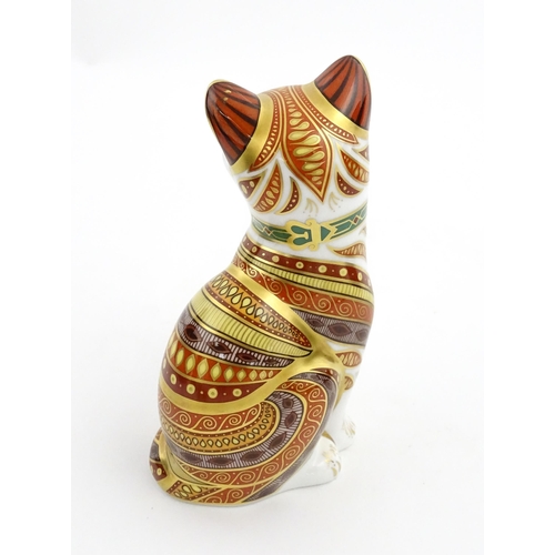 105 - A Royal Crown Derby paperweight modelled as a seated cat, Marmaduke. Marked under, limited edition. ... 