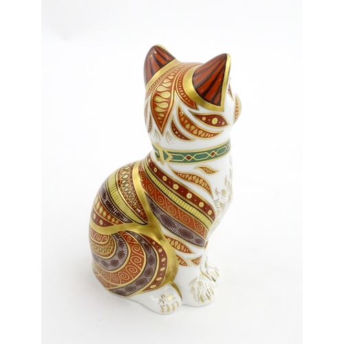 105 - A Royal Crown Derby paperweight modelled as a seated cat, Marmaduke. Marked under, limited edition. ... 